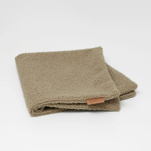 La Couverture en Bouclé